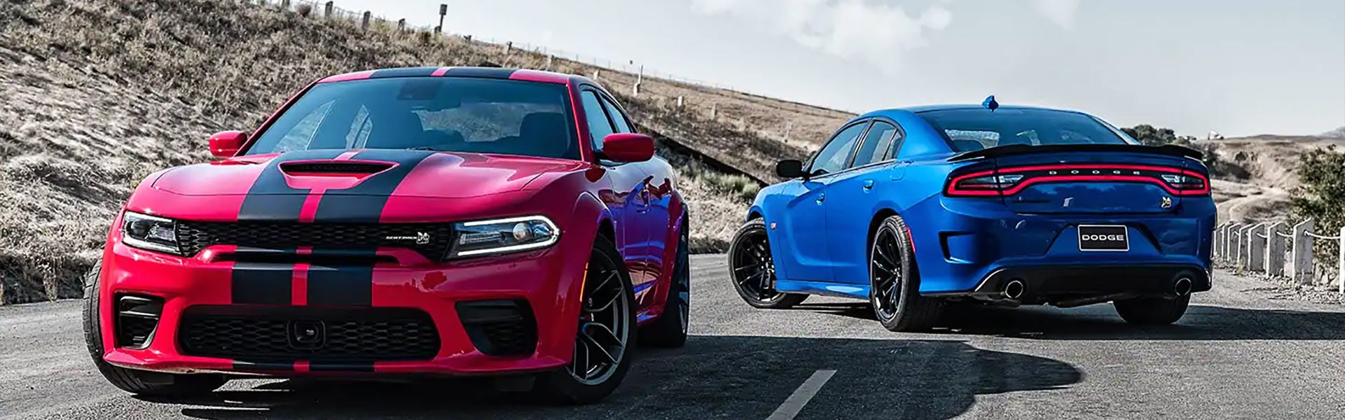 Two 2021 Dodge Charger on the road